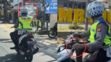Viral Polisi merokok saat mengendarai sepeda motor